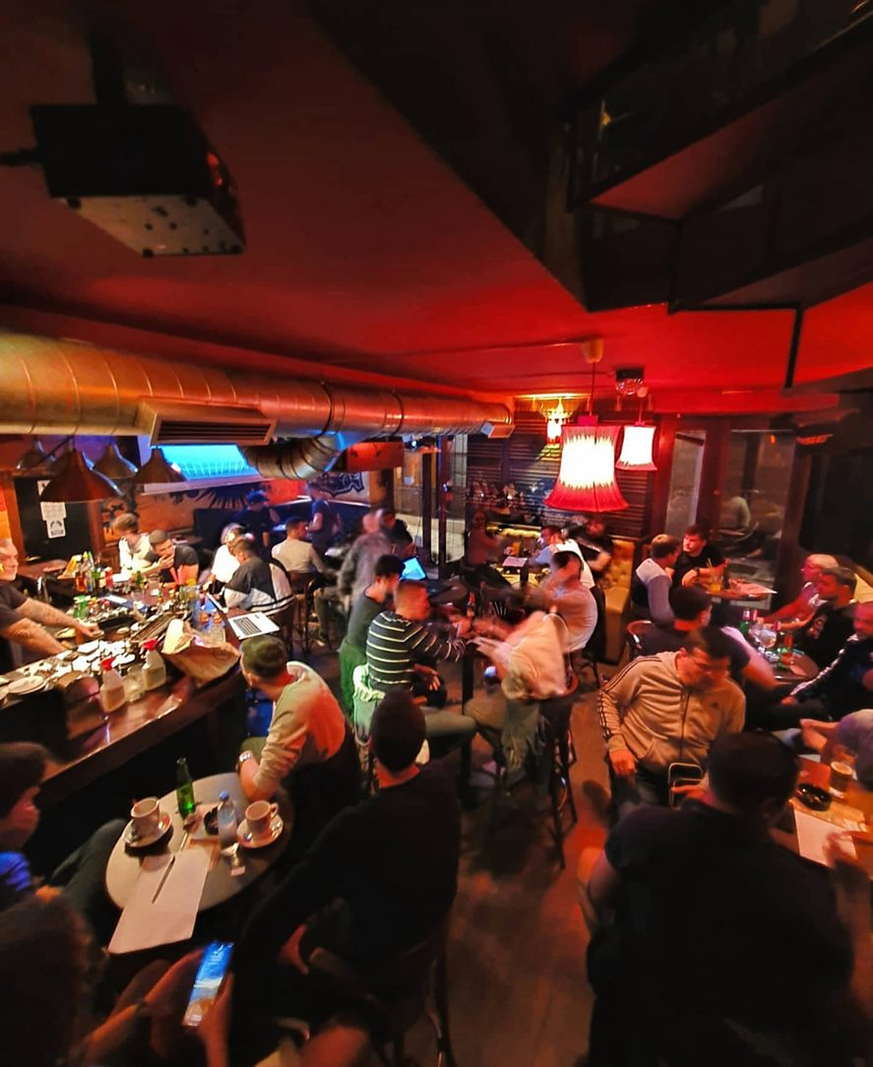The bar counter and guests seen from above